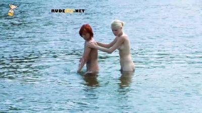 Skinny and young nudist ladies fool around on the beach - hclips.com